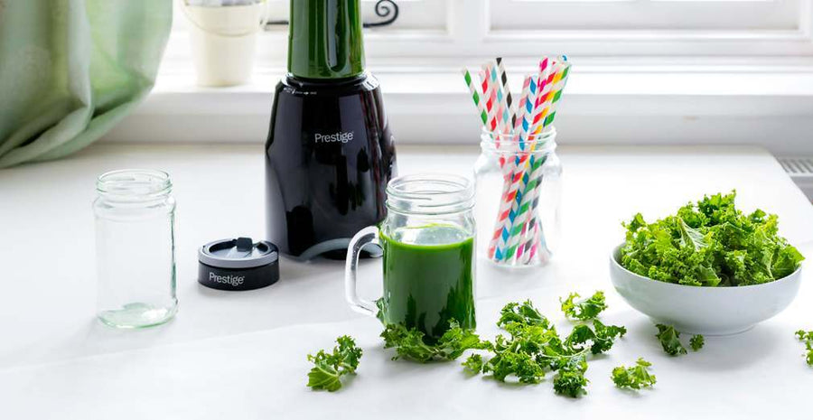 green kale smoothie on a countertop