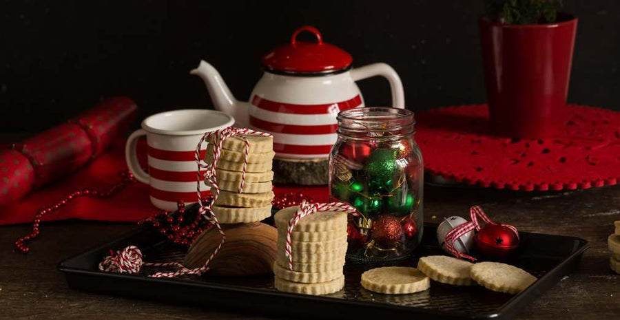 stacked shortbread biscuits with a prestige vintage tea set