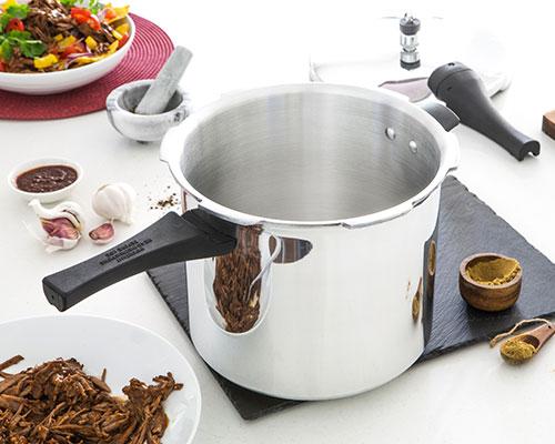 Stainless Steel Prestige Pressure Cooker on Worktop